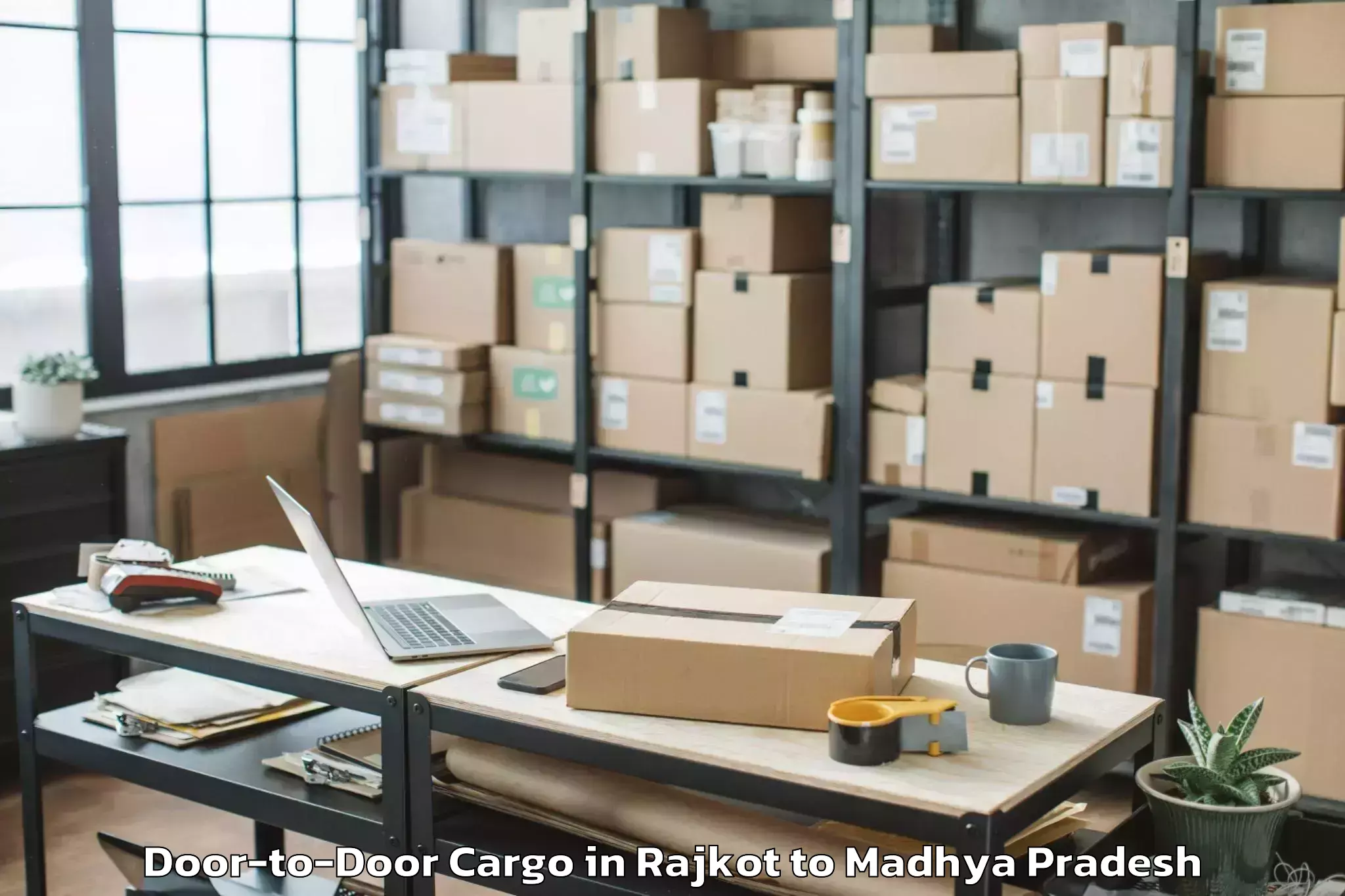 Book Your Rajkot to Patharia Door To Door Cargo Today